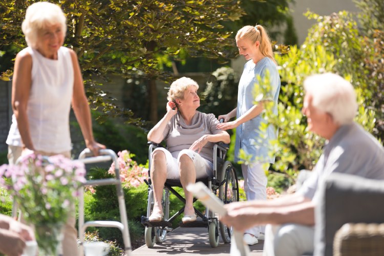 Assisted living seniors outdoors